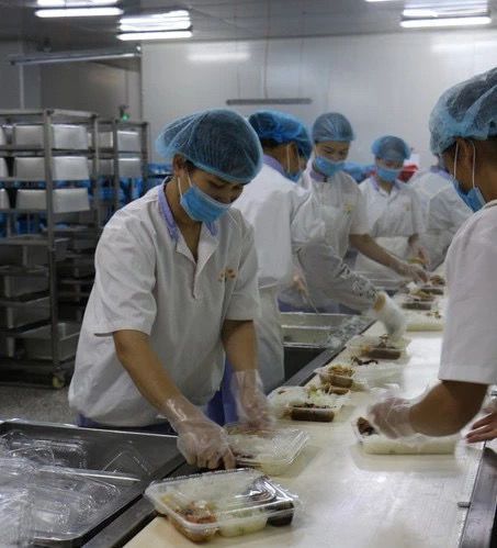 海口高新区防疫情促生产 力合泰食品无接触配送